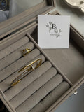 Cartiers nail cuff and ring set