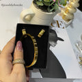 Set of handcuff and earrings